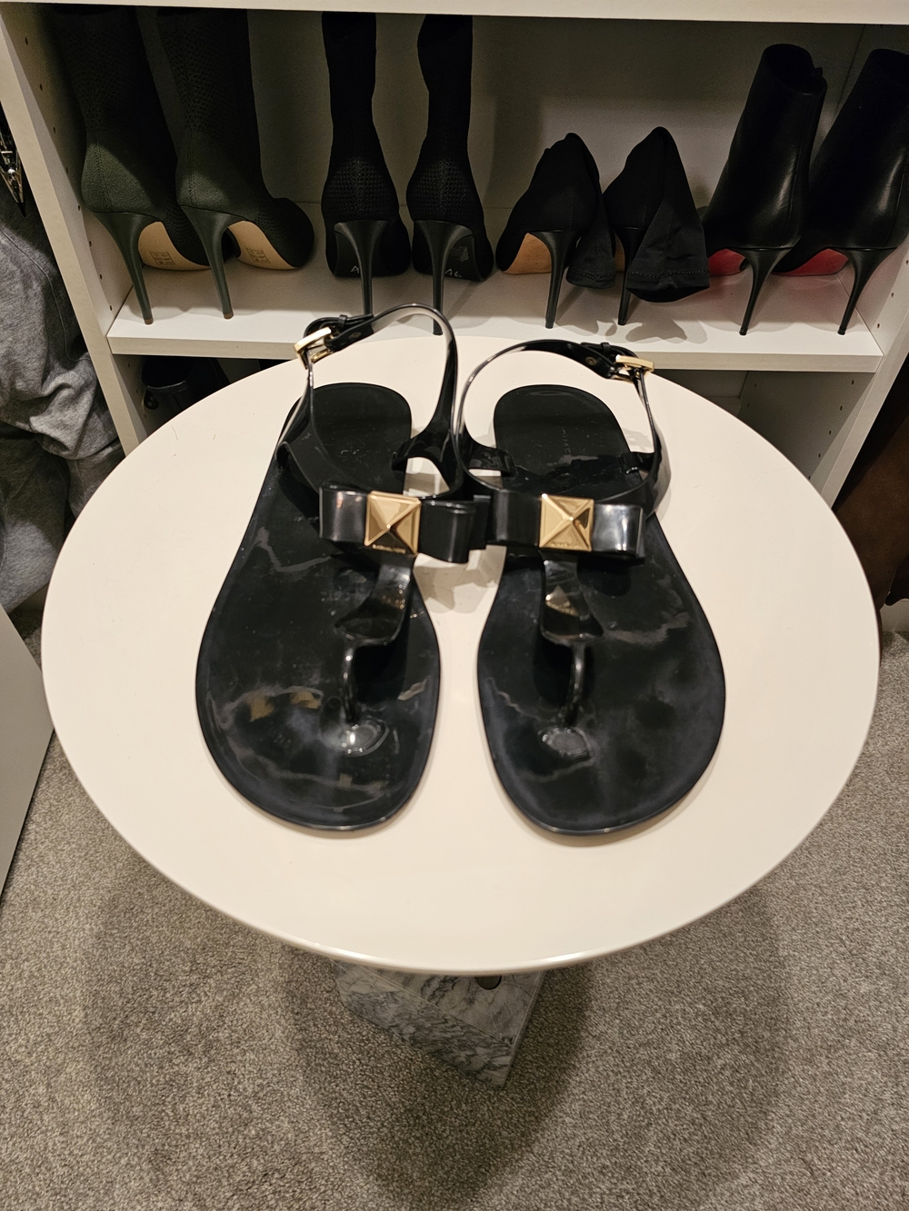 Michael Kors Black Jelly T-Strap Sandals with Gold Pyramid Detail